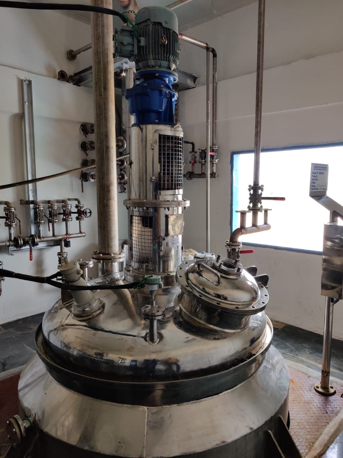 Close-up of reactor vessel with valve controls